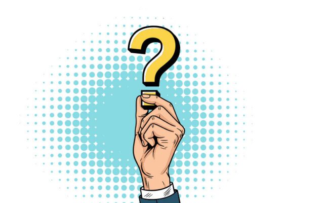 Hand holding up a question mark