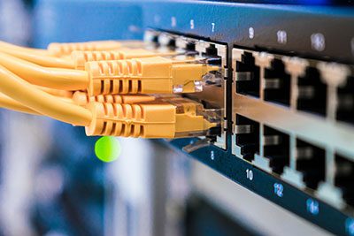 Close up of Ethernet Cat5e cable in an industrial switch